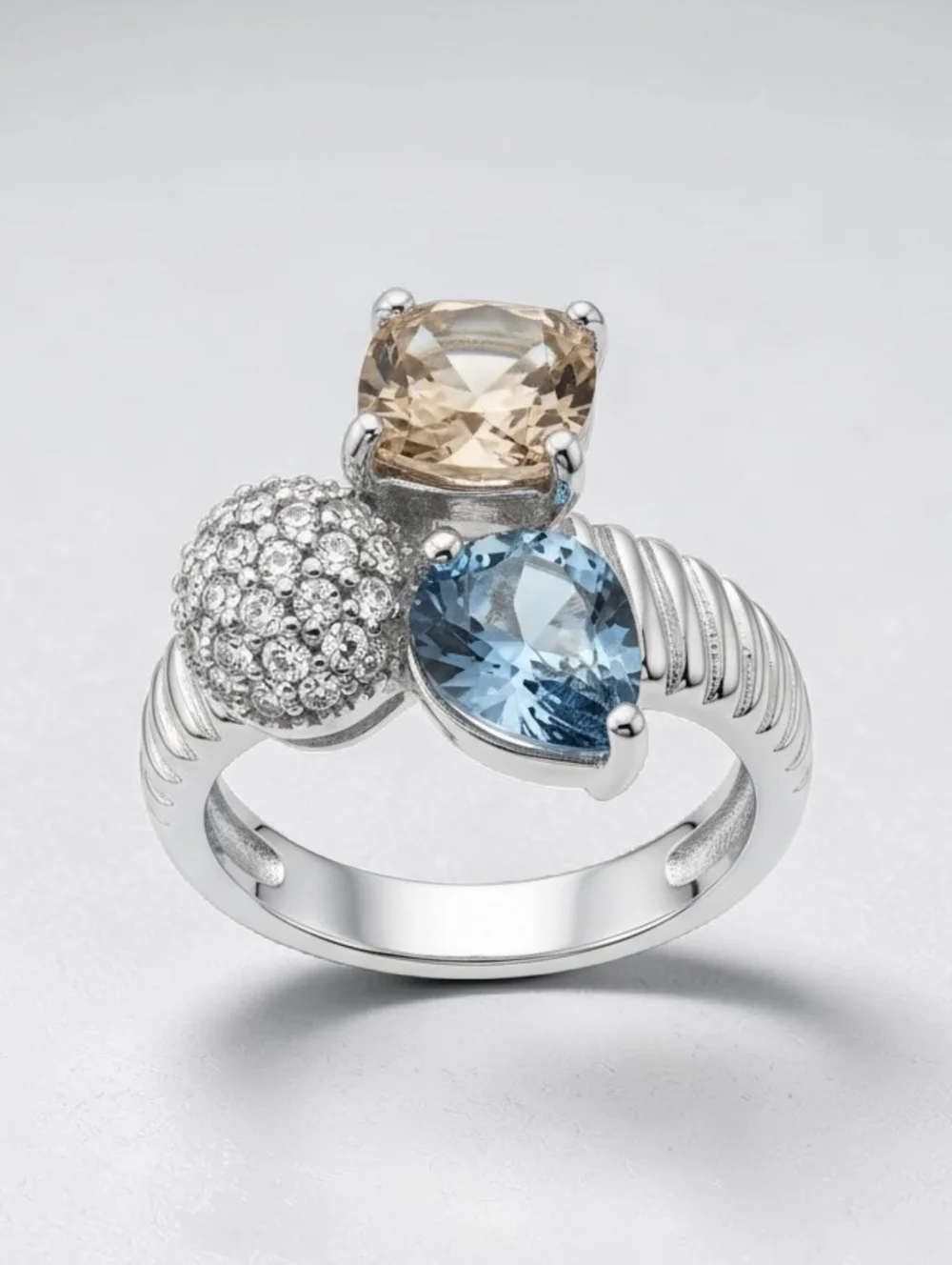 NWT EYE CANDY BRASS Multi-Stone Cocktail Ring with Blue and Champagne Stones - Picture 1 of 6